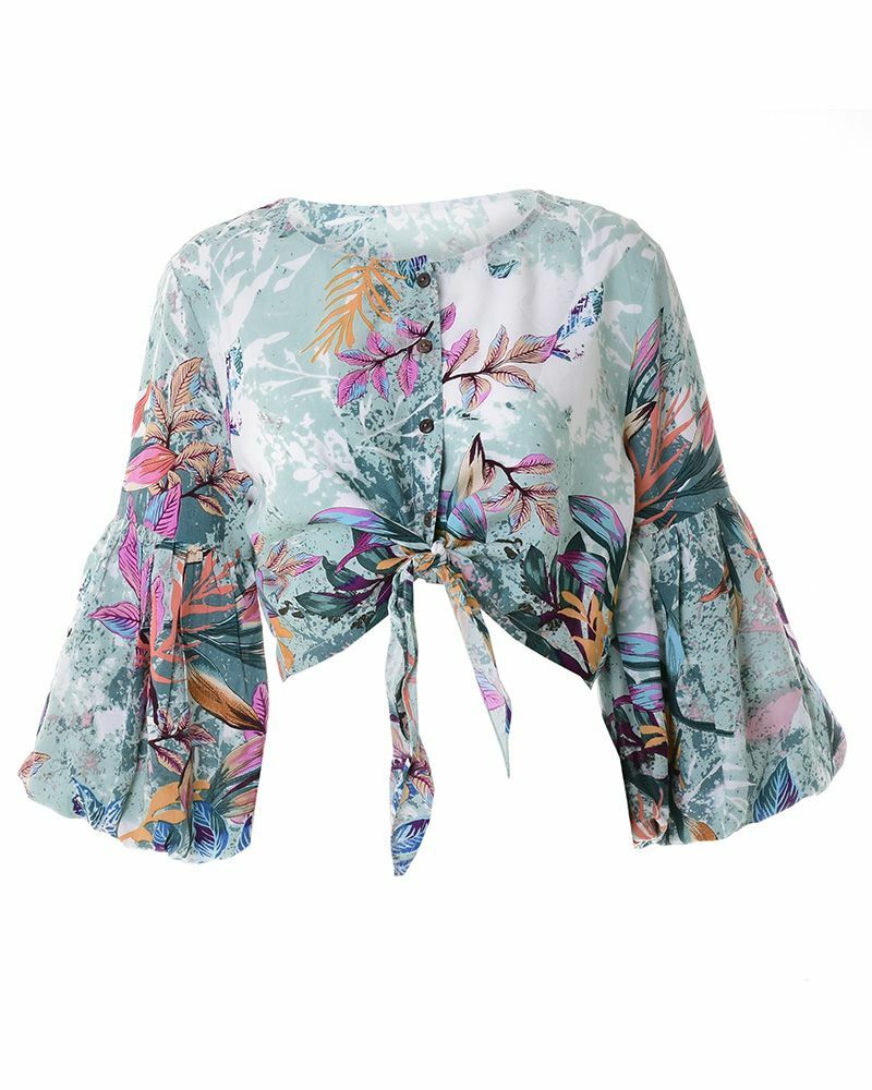 Blusa con maniche larghe con fiori. taglia unica (viscosa al 100%)