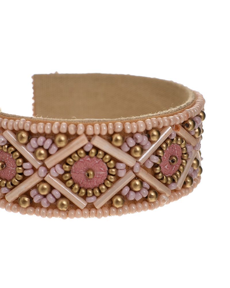 Bracciale in colore rosa con perline